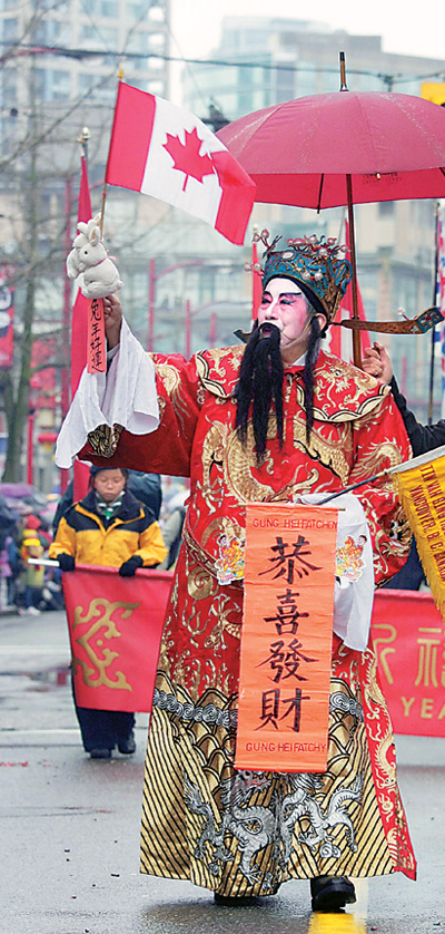 2月6日,在加拿大温哥华市"财神爷"在唐人街