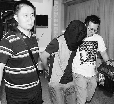 记者探访网络警察汪海涛:与网络犯罪"明枪暗斗"